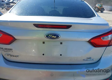 2014 Ford Focus Se z USA, uszkodzony, nr VIN 1FADP3F21EL190247